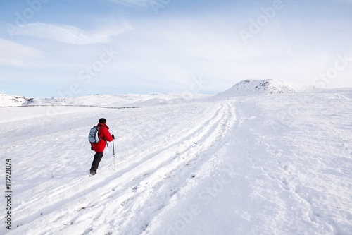Woman hiking in snow
