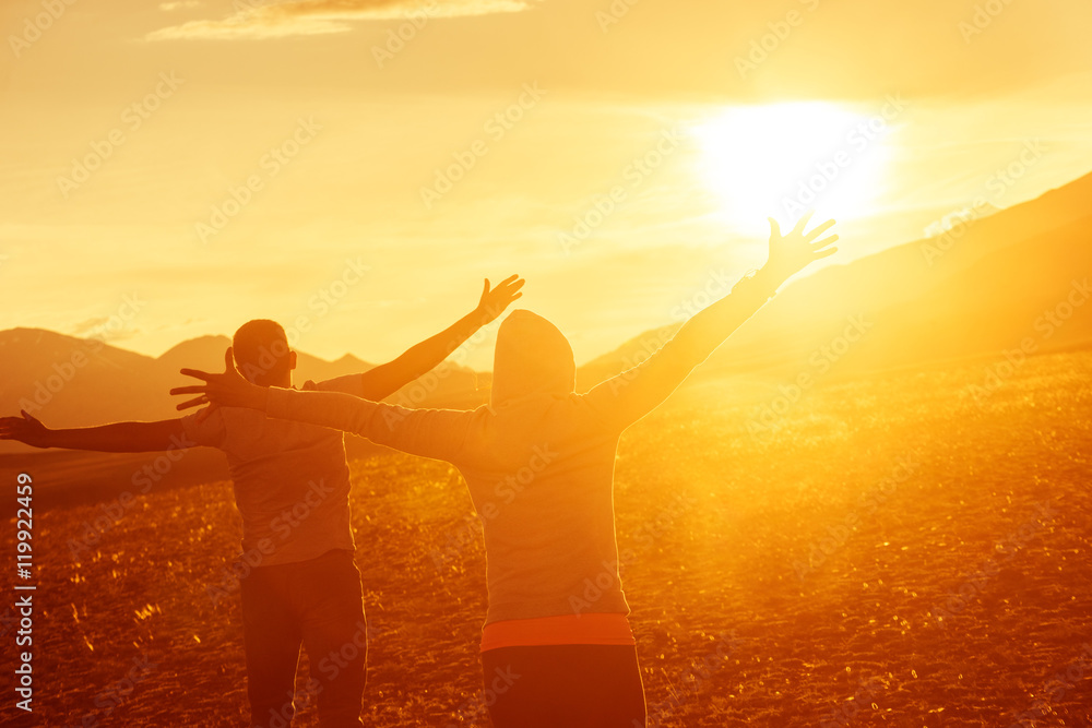 Fototapeta premium Happy couple having fun on sunset