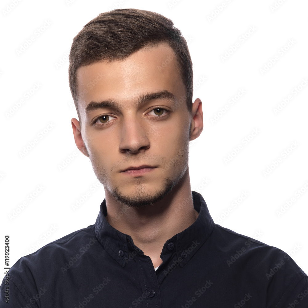 Fototapeta premium Young handsome man in a dark shirt.