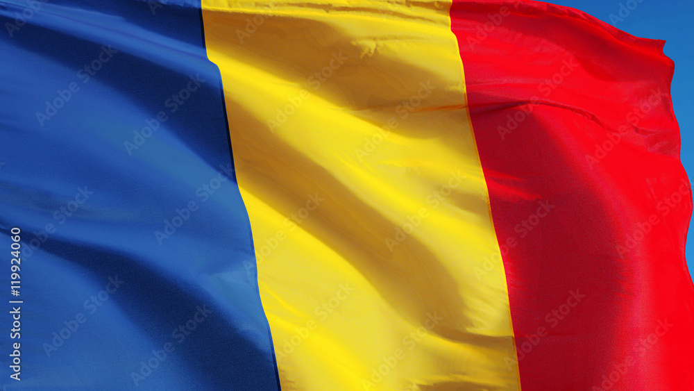 Fototapeta premium Chad flag waving against clean blue sky, close up, isolated with clipping path mask alpha channel transparency