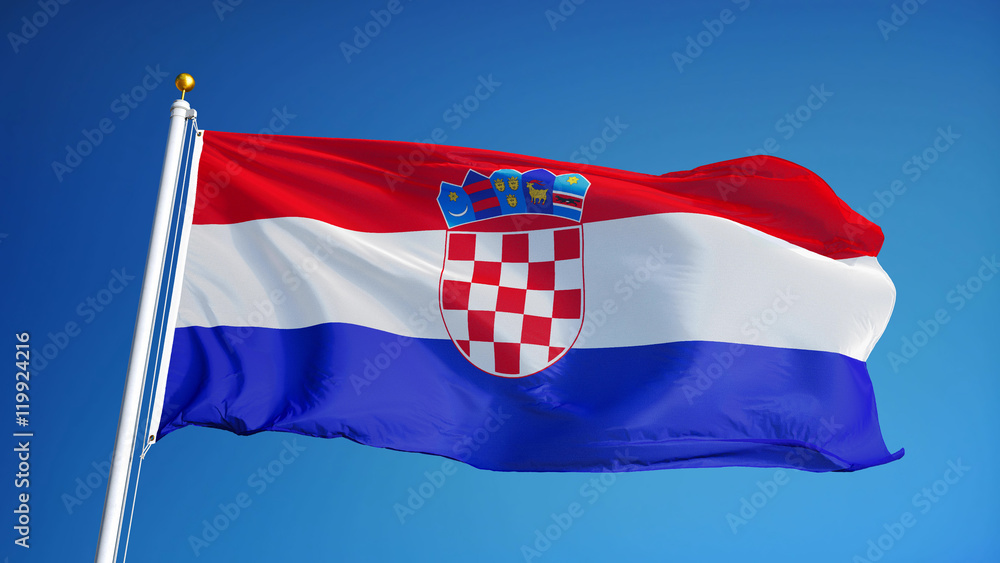 Naklejka premium Croatia flag waving against clean blue sky, close up, isolated with clipping path mask alpha channel transparency