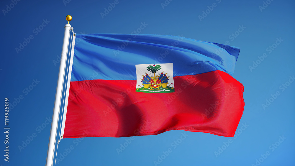 Naklejka premium Haiti flag waving against clean blue sky, close up, isolated with clipping path mask alpha channel transparency