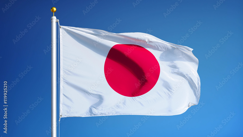 Obraz premium Japan flag waving against clean blue sky, close up, isolated with clipping path mask alpha channel transparency