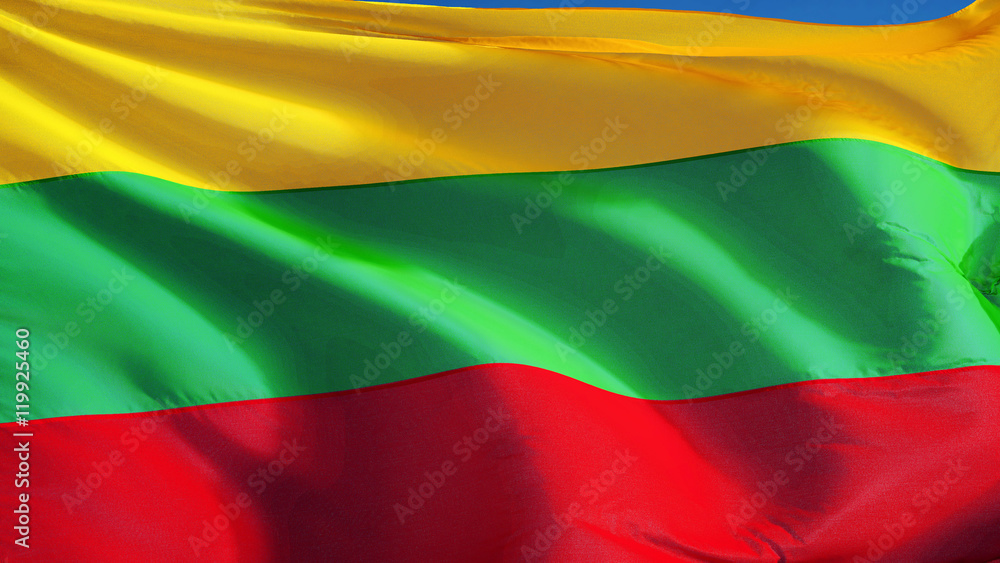 Fototapeta premium Lithuania flag waving against clean blue sky, close up, isolated with clipping path mask alpha channel transparency