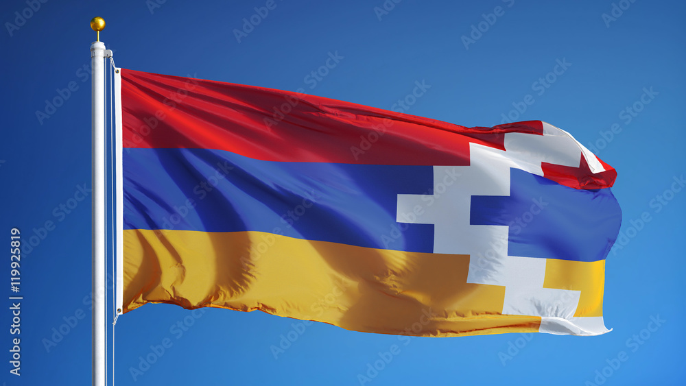 Nagorno-Karabakh flag waving against clean blue sky, close up, isolated with clipping path mask alpha channel transparency