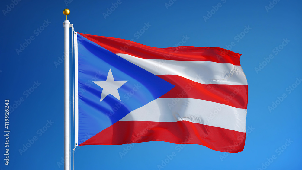 Puerto Rico flag waving against clean blue sky, close up, isolated with clipping path mask alpha channel transparency Puerto Rico flag waving against clean blue sky, close up, isolated with clipping path mask alpha channel transparency