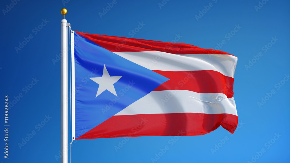 Puerto Rico flag waving against clean blue sky, close up, isolated with clipping path mask alpha channel transparency Puerto Rico flag waving against clean blue sky, close up, isolated with clipping path mask alpha channel transparency