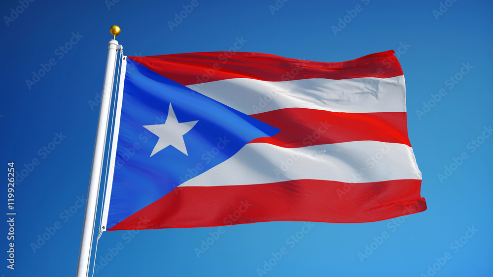 Fototapeta premium Puerto Rico flag waving against clean blue sky, close up, isolated with clipping path mask alpha channel transparency