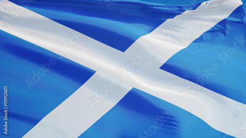 Scotland flag waving against clean blue sky, close up, isolated with clipping path mask alpha channel transparency photo