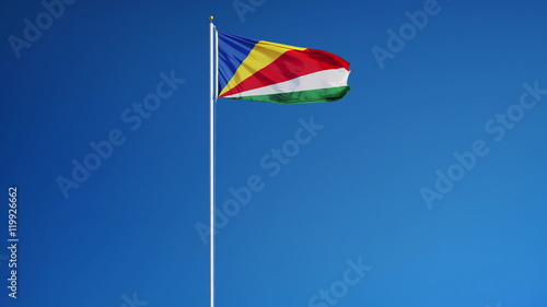 Seychelles flag waving against clean blue sky, long shot, isolated with clipping path mask alpha channel transparency