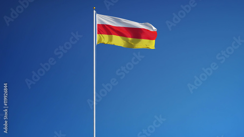 South Ossetia flag waving against clean blue sky, long shot, isolated with clipping path mask alpha channel transparency