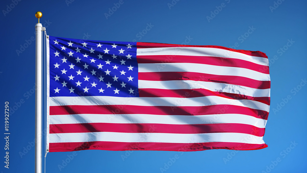 Obraz premium USA flag waving against clean blue sky, close up, isolated with clipping path mask alpha channel transparency