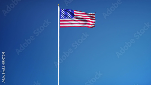 USA flag waving against clean blue sky, long shot, isolated with clipping path mask alpha channel transparency