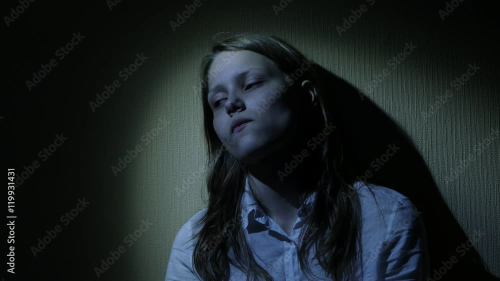 Scared teen girl in a dark. 4K UHD. Scared teen girl in a dark. 4K UHD.