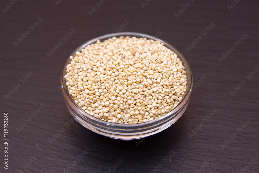 Bowl with quinoa on a slate floor Bowl with quinoa on a slate floor