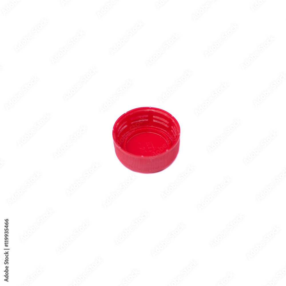 Red plastic bottle cap isolated on white Red plastic bottle cap isolated on white