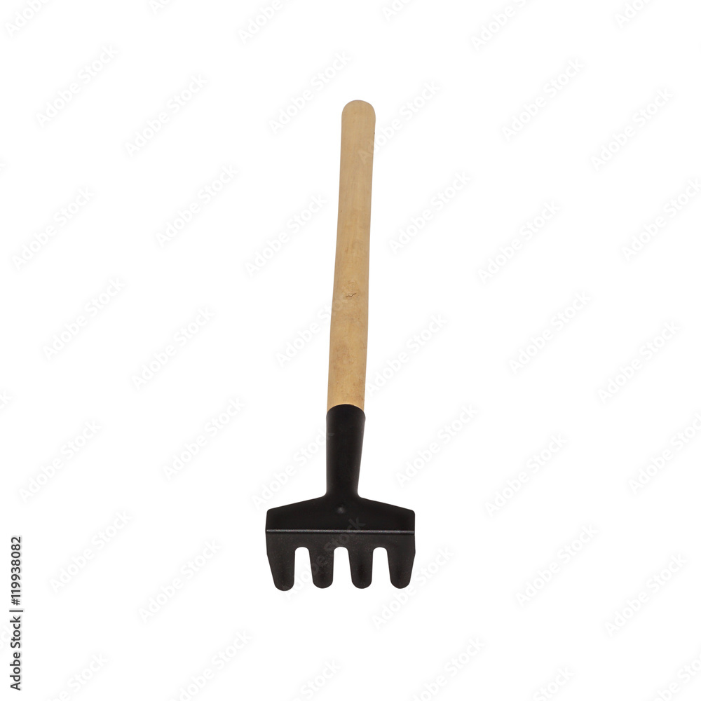 Garden little rake isolated on a white background Garden little rake isolated on a white background