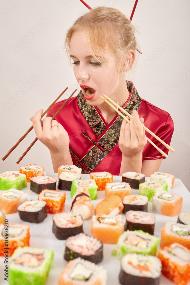 girl eats sushi