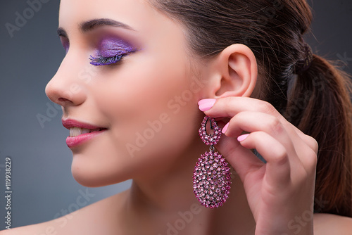 Beautiful woman with jewellery in fashion concept