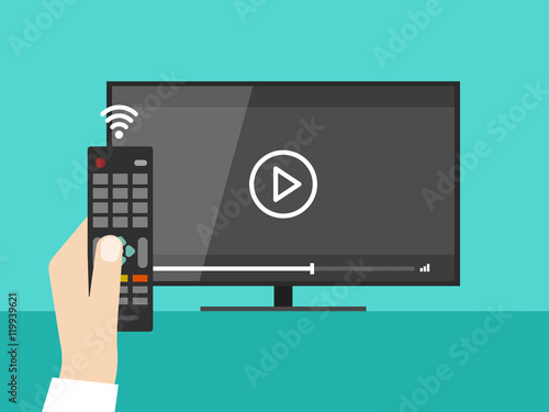 Hand holding wireless remote control near flat screen tv watching video film, cartoon person watching movie on television display