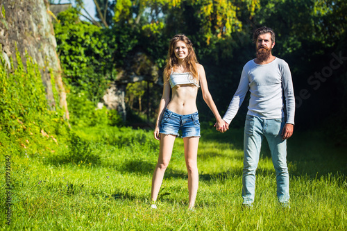 sexy young couple on green grass