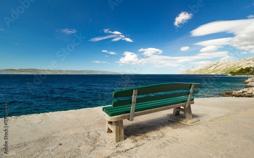 Empty bench by the sea, beautiful landscape © pixel_dreams