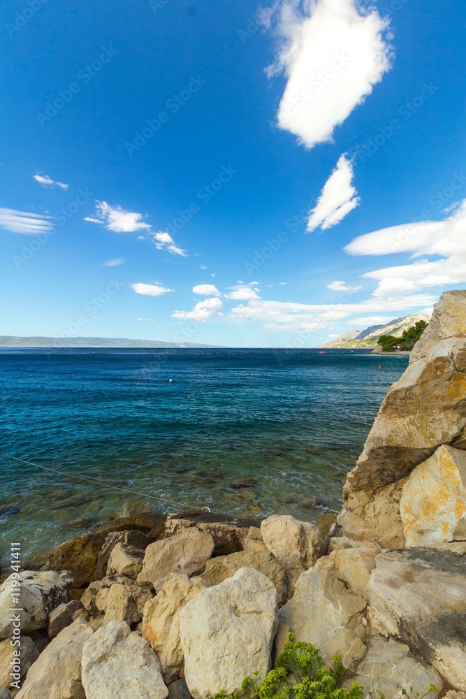 Mediterranean sea coast at a sunny day, vertical landscape Mediterranean sea coast at a sunny day, vertical landscape