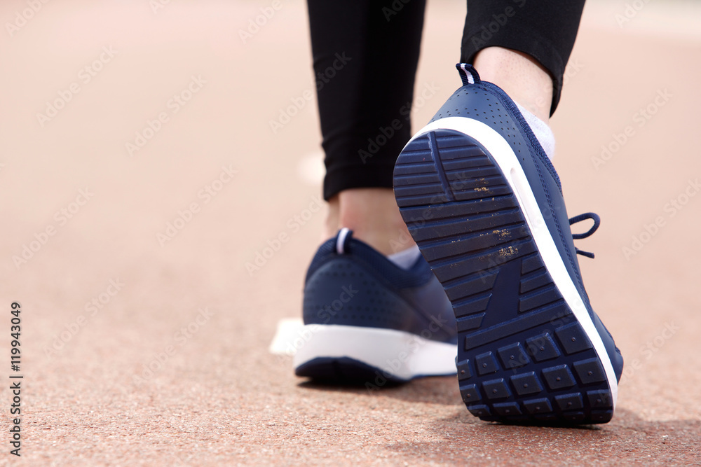 Sneakers on pavement