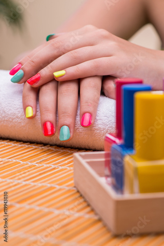 Woman in hand treatment manicure concept