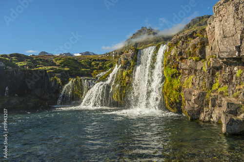 Wonderful waterfal Kirkjufellsfossl in Iceland  summer time