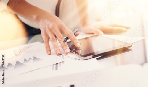Young Business Woman Analyze Meeting Report Process.Online Startup Marketing Project.Creative People Making Great Work Decisions Modern Office.Tablet Graphs Diagram Screen.Closeup.Blurred Background.