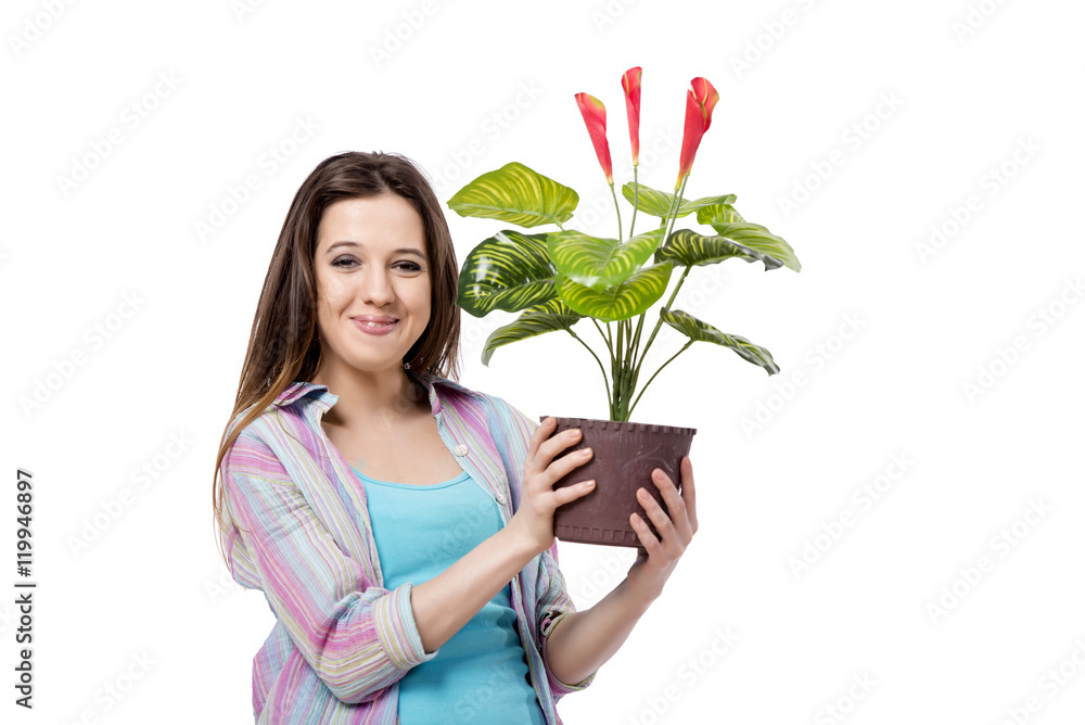 Young woman taking care of plants isolated on white Young woman taking care of plants isolated on white