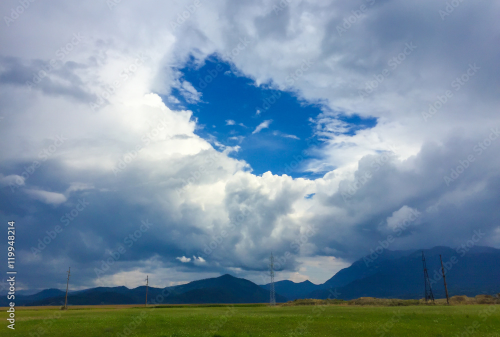 Fototapeta premium Beautiful round clouds on blue sky, in summer season