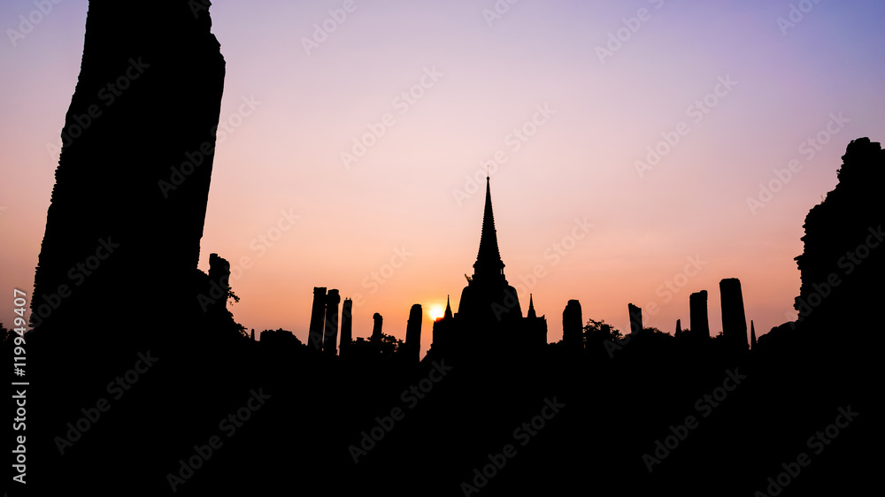 Silhouette for background, Ancient ruins and pagoda of Wat Phra Si Sanphet old temple famous attractions during sunset at Phra Nakhon Si Ayutthaya Historical Park, Thailand, 16:9 wide screen