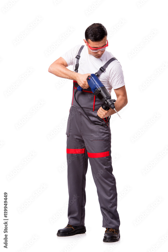 Young repairman with drill perforator isolated on white Young repairman with drill perforator isolated on white