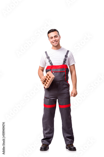 Young worker with brick isolated on white