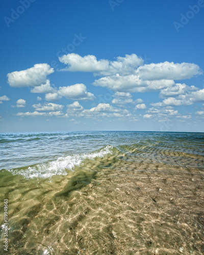 Beauty marine landscape with sea surface, waves and blue skies