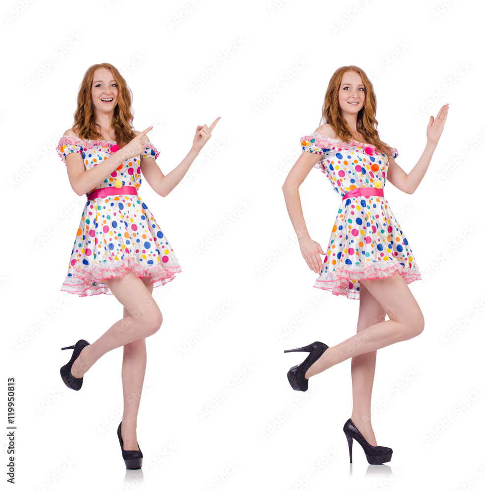 Young woman in polka dot dress isolated on white Young woman in polka dot dress isolated on white