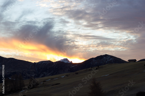 Mountain views of Alpe di Siusi with red sunrise