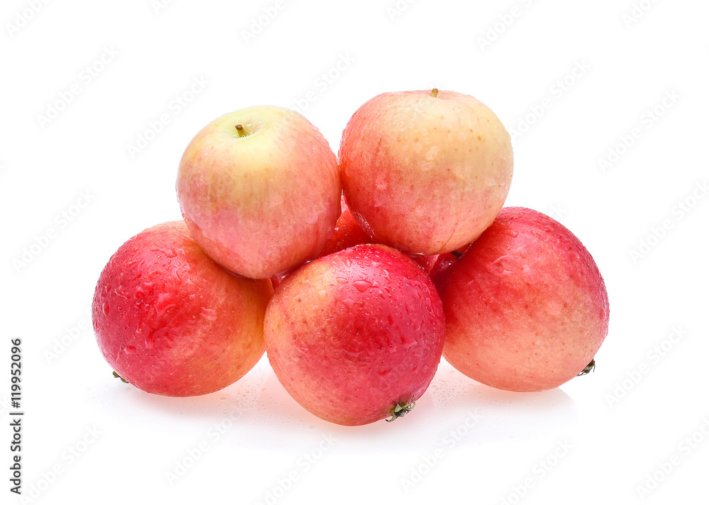 Red ripe apple with water drop isolated on white background