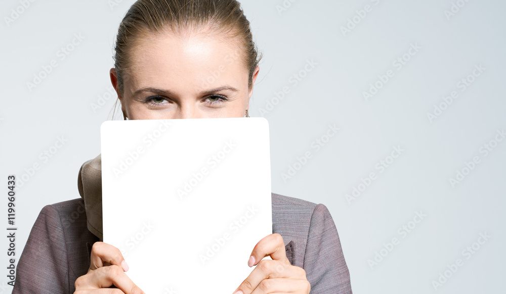 Portrait of a pretty brunette lady with white board Portrait of a pretty brunette lady with white board