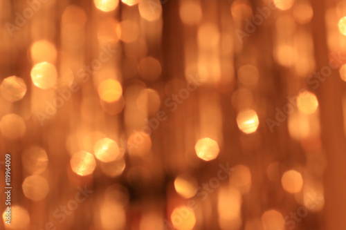 Festive gold background with bokeh effect