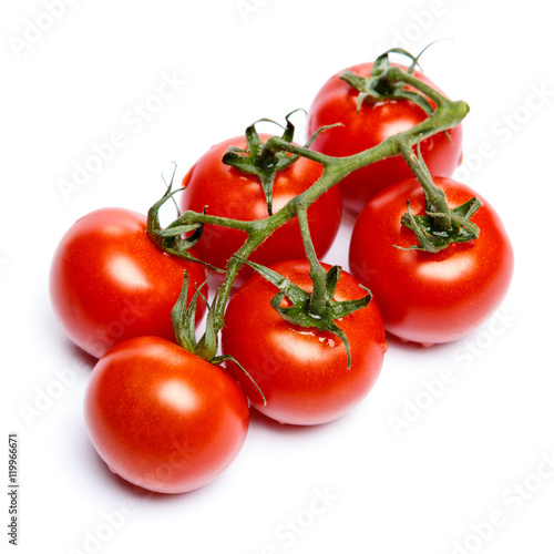 Plum tomatoes with leaves on white background