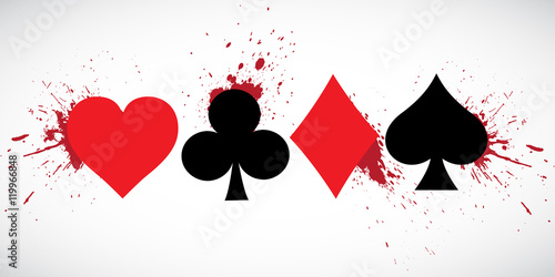 The suits of the deck of playing cards on a background of splashing. Grunge.