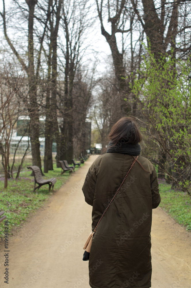 Back of the girl on a path Back of the girl on a path