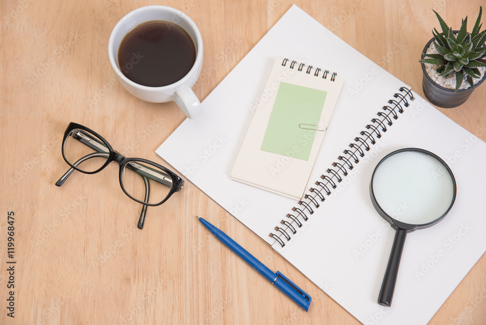 Business's desk of office supplies and gadgets coffee cup, pen, Business's desk of office supplies and gadgets coffee cup, pen,