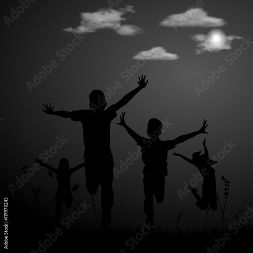 The active group of children spend a happy time of the sunset in the meadow