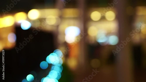 Wallpaper Mural Blur holiday light bokeh background with people shadow walking  Torontodigital.ca