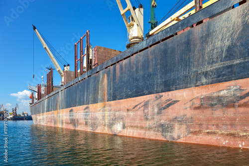 A big ship loading cargo at port of Gdansk, Poland.