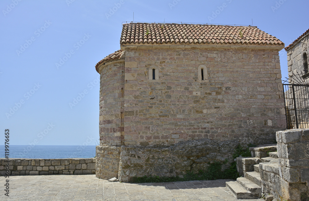The Pre-Roman church of Santa Maria in Punta was built in Budva in 840 by the Benedictines was later taken over by the Franciscans.

